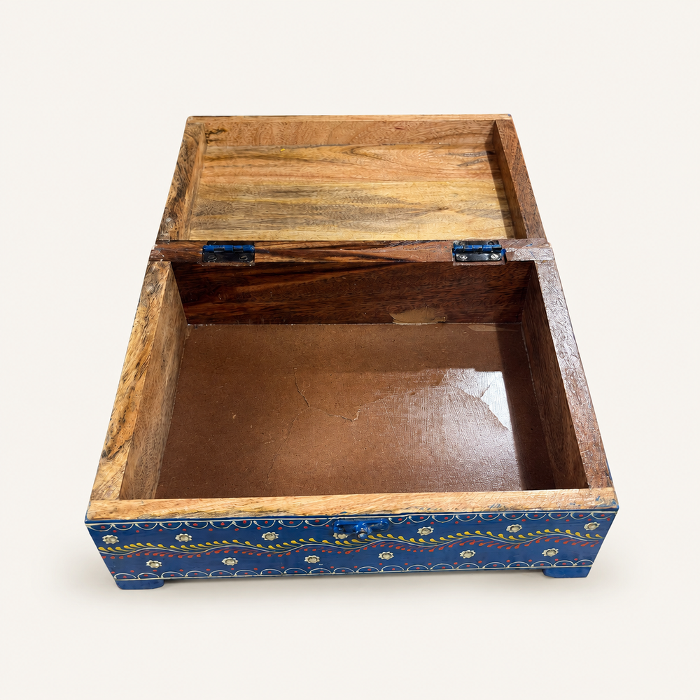 Open Rang Tarang chest showing one compartment and visible wood grain on the inner sides and lid