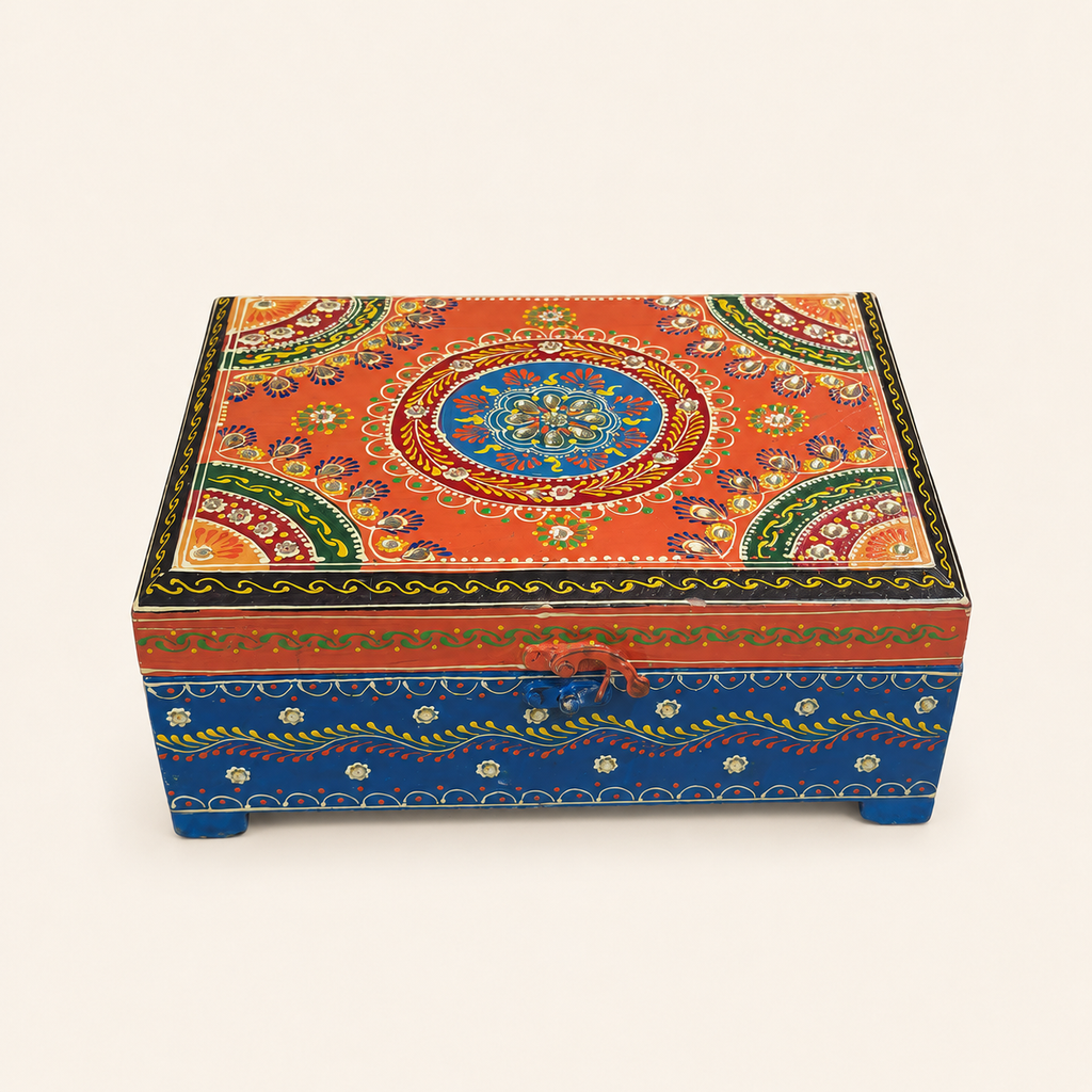Rang Tarang keepsake chest with an orange floral mandala lid, mirror accents, blue base and curved front clasp