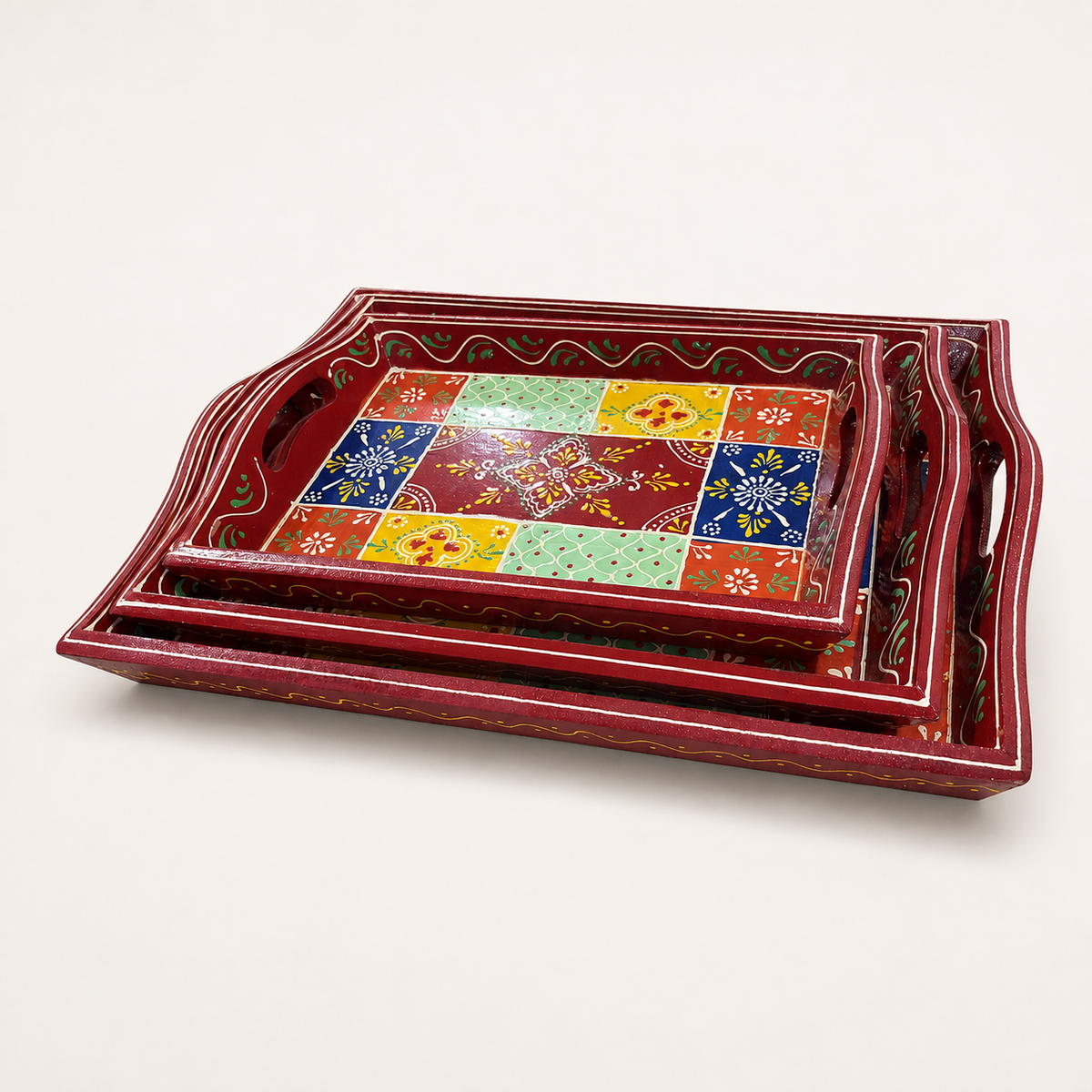 Rangoli Bloom set of three red multicolour floral nested trays, angled view