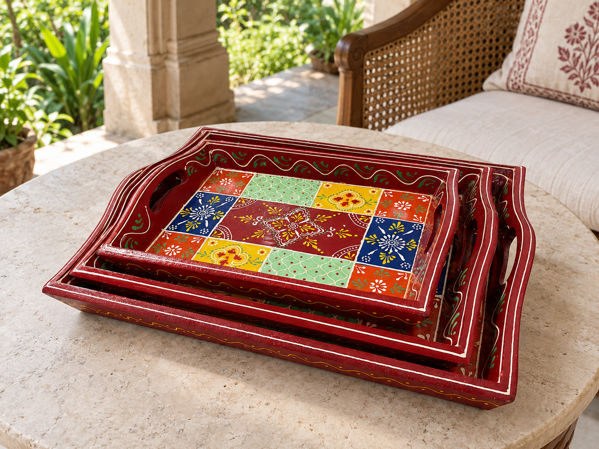 Rangoli Bloom tray set styled on a round table in a verandah