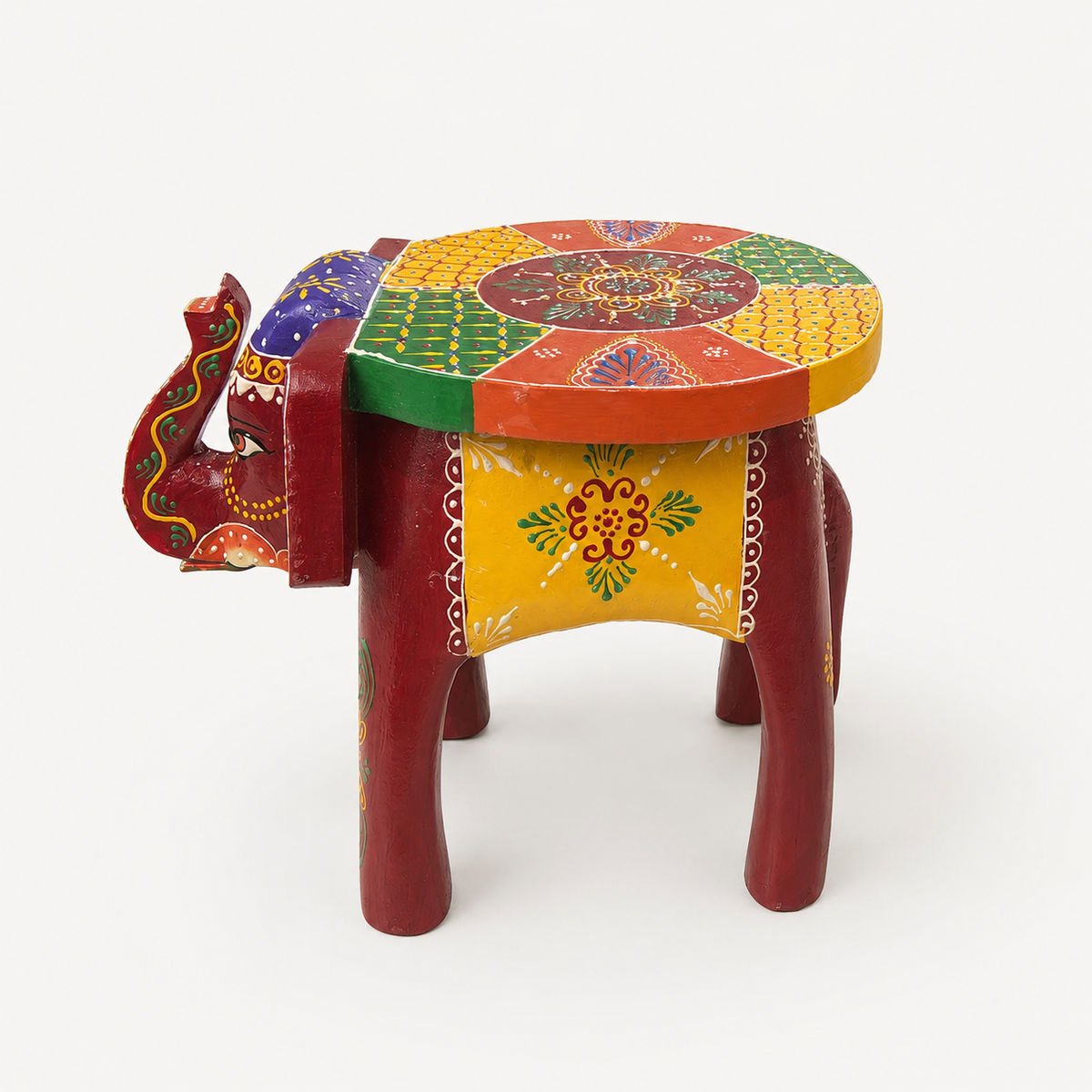 Side view of the colourful elephant-shaped mini decorative stool