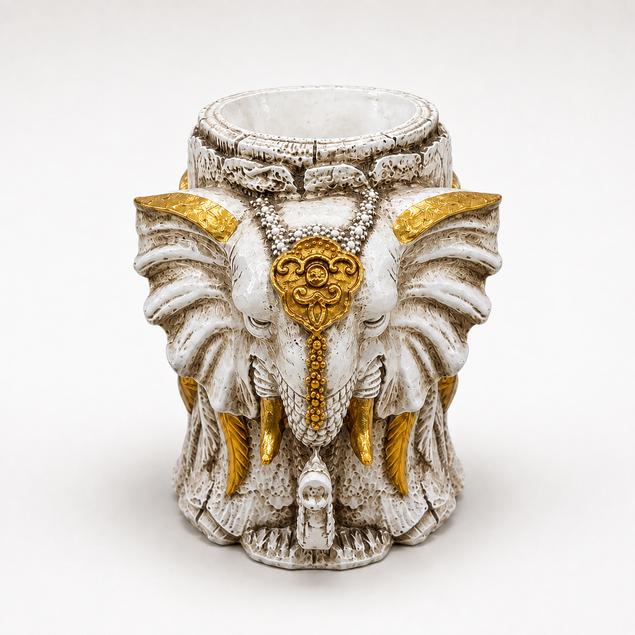 Regal Elephant ivory and gold pen and brush holder, front view