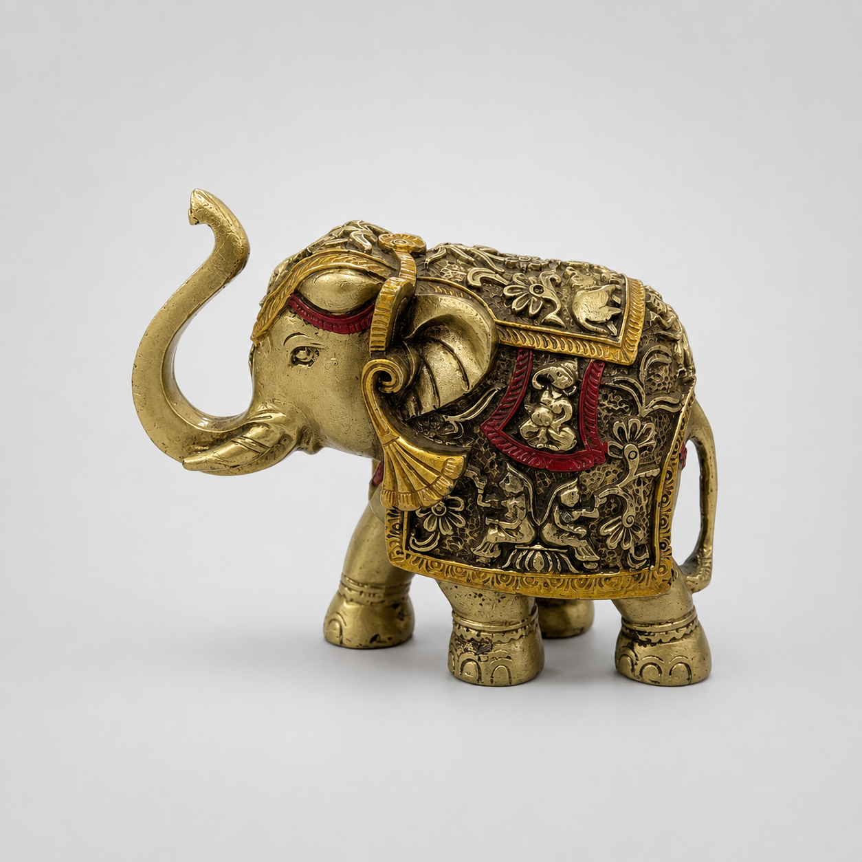 Regal Heritage gold and red ornate elephant decorative sculpture, side view