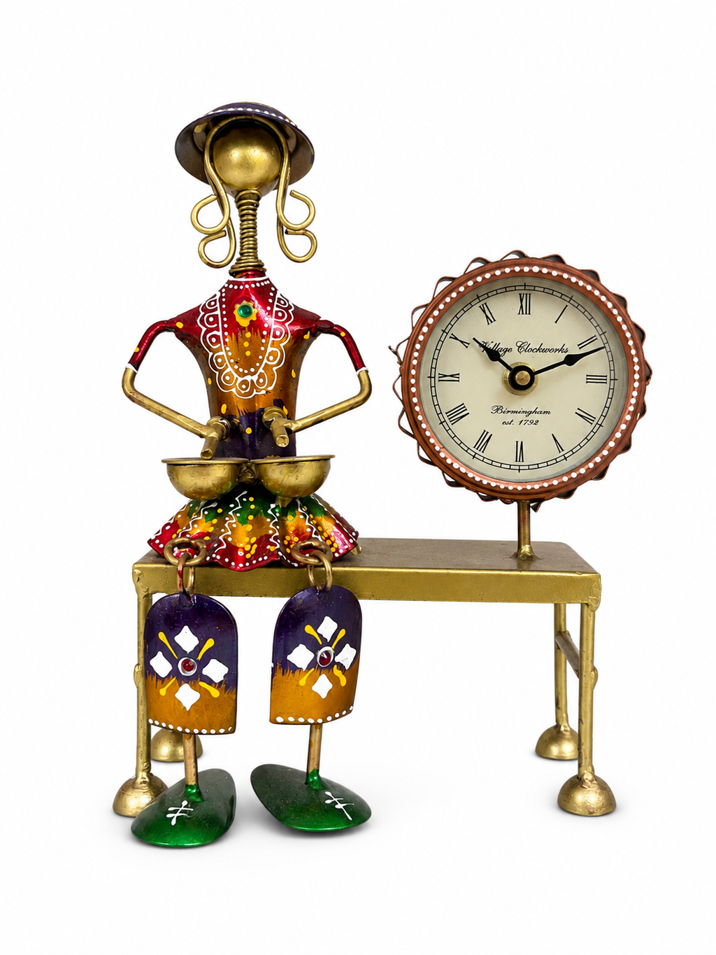Colourful folk drummer sculpture with analog table clock, front view