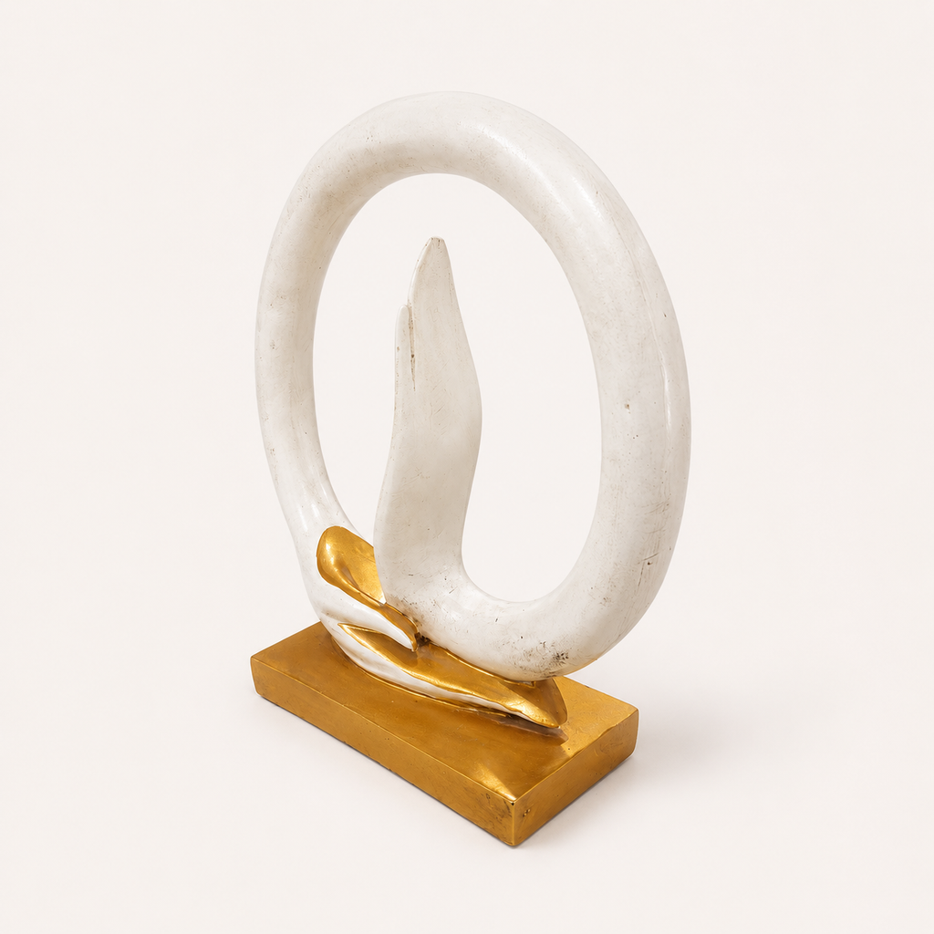 Serene Mudra ivory and gold circular decorative sculpture, angled view