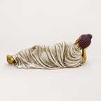 Ivory, gold, and burgundy reclining Buddha sculpture, rear view