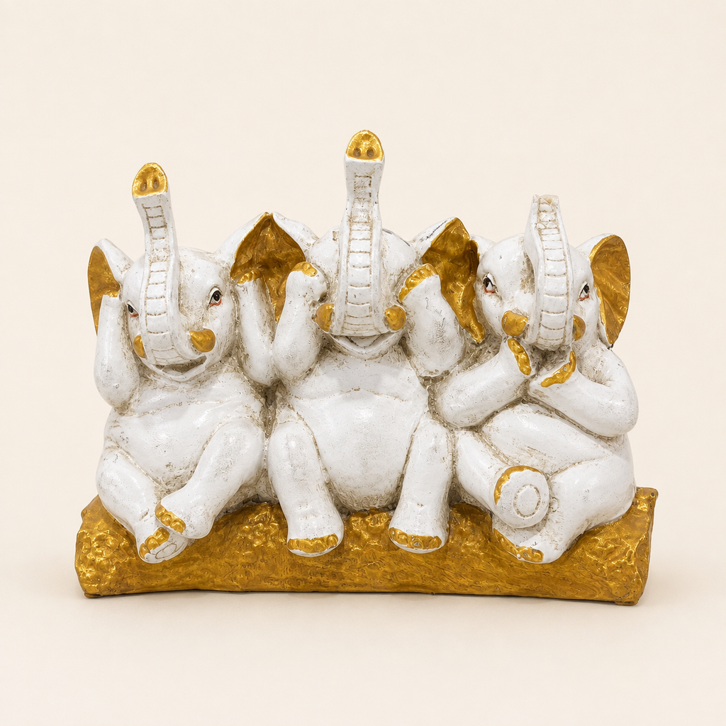 Three Wise Elephants ivory and gold decorative sculpture, front view
