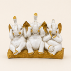 Three Wise Elephants ivory and gold decorative sculpture, front view