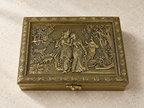 Radha Krishna relief jewellery organiser box displayed on ivory limestone
