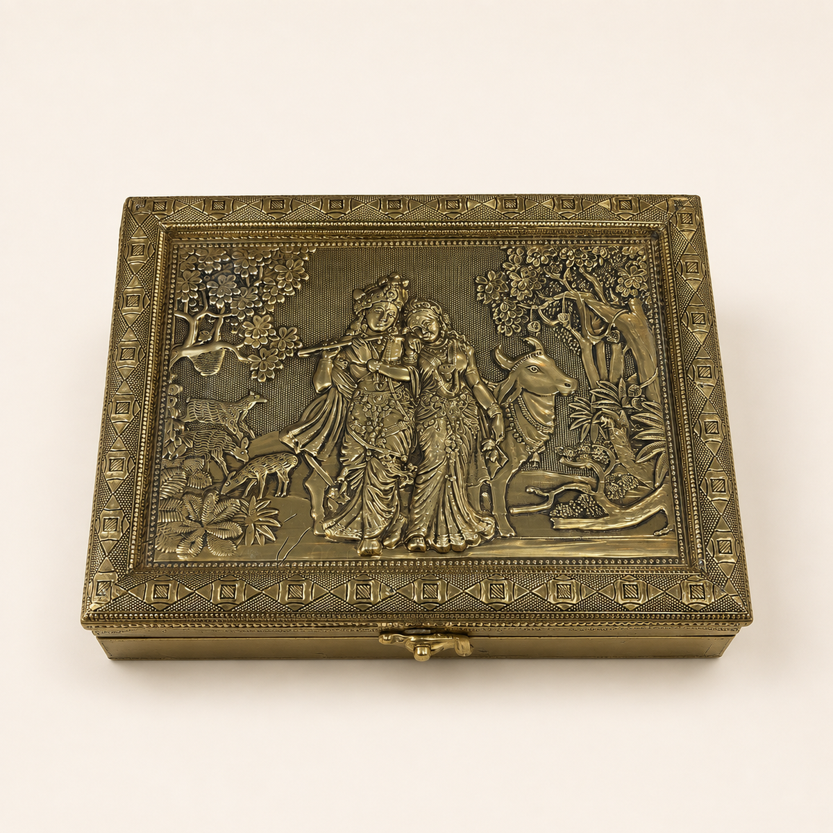 Vrindavan Radha Krishna jewellery organiser box with an ornate gold-tone relief lid and front clasp