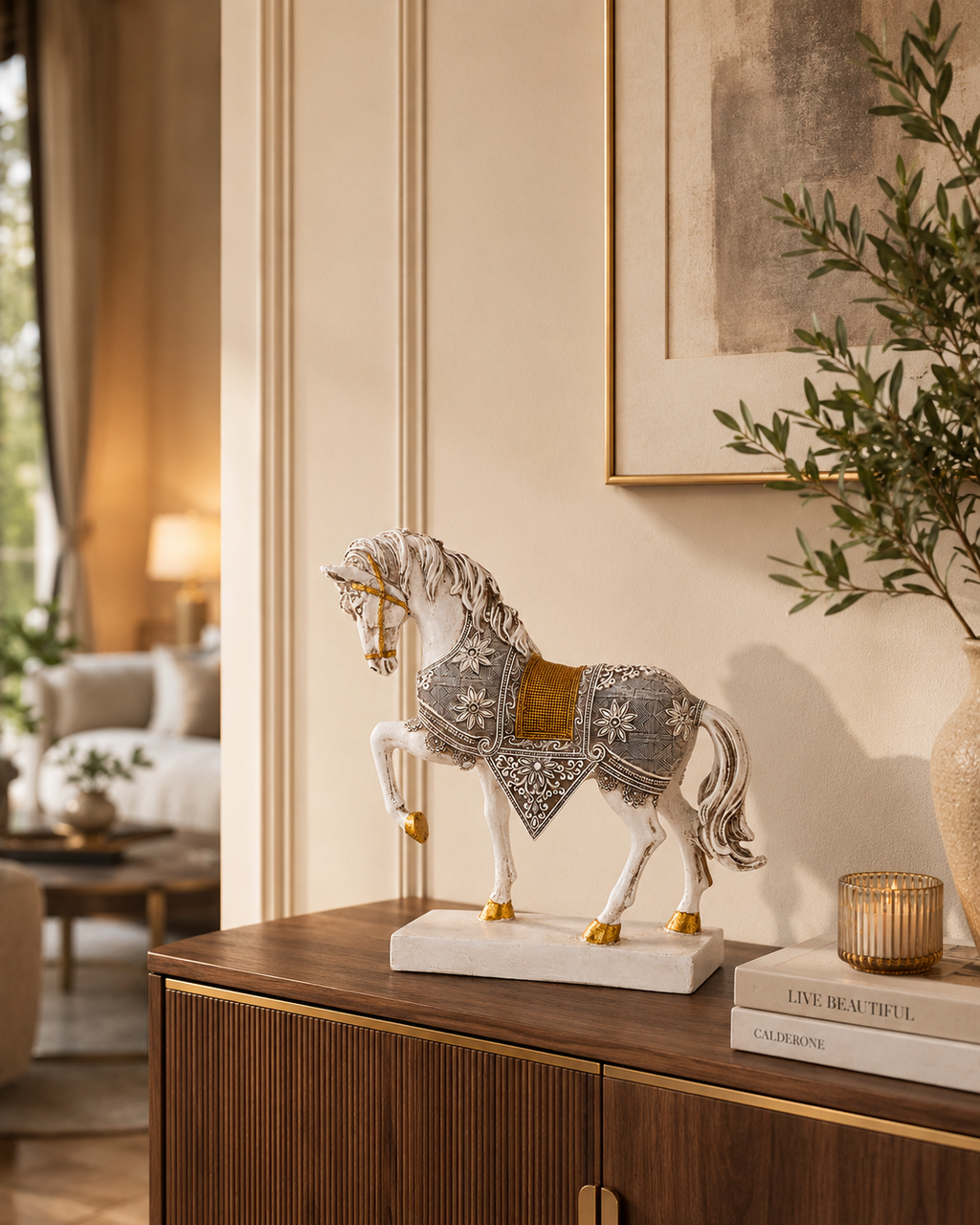 White and gold prancing horse sculpture displayed on a console table